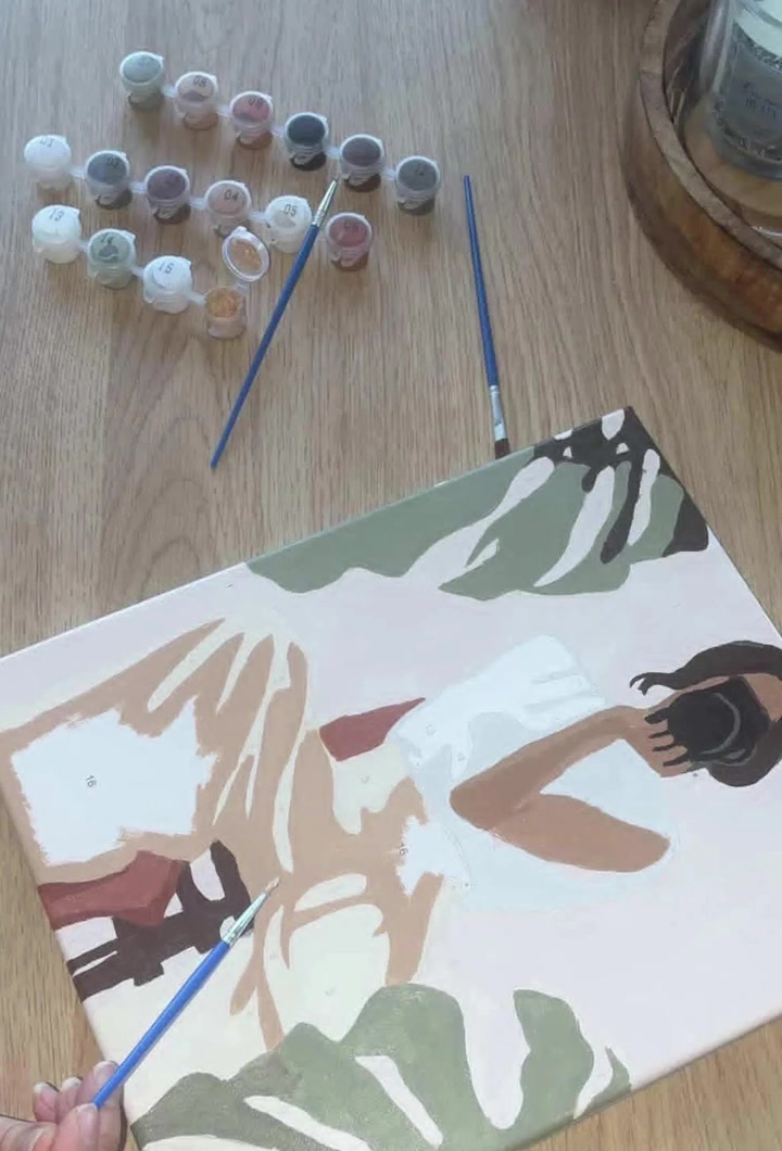 La femme à l'appareil photo | Peinture aux numéros